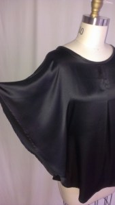 "wing" sleeve of batwing top.