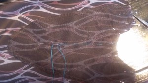 front facing basting stitches to mark the cutting line